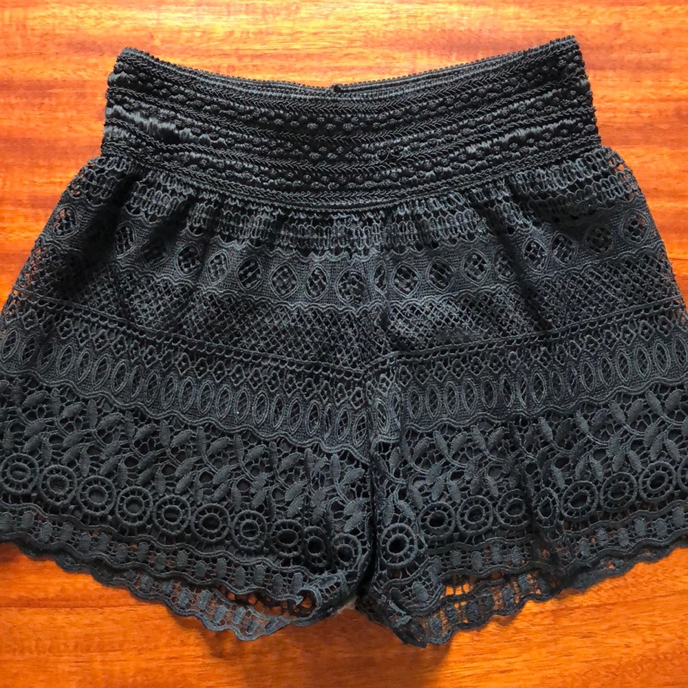 black shorts with lace overlap